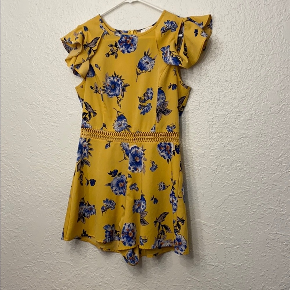 Short romper with off the shoulder ruffle sleeves